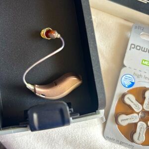 Beige Hearing Aid with cleaning kit and Batteries